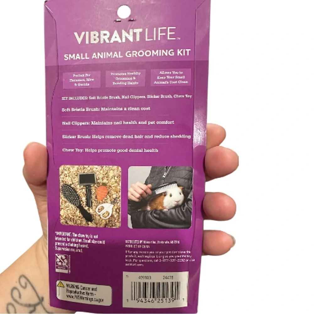 Part Of A Vibrant Purple Small Animal Grooming Set